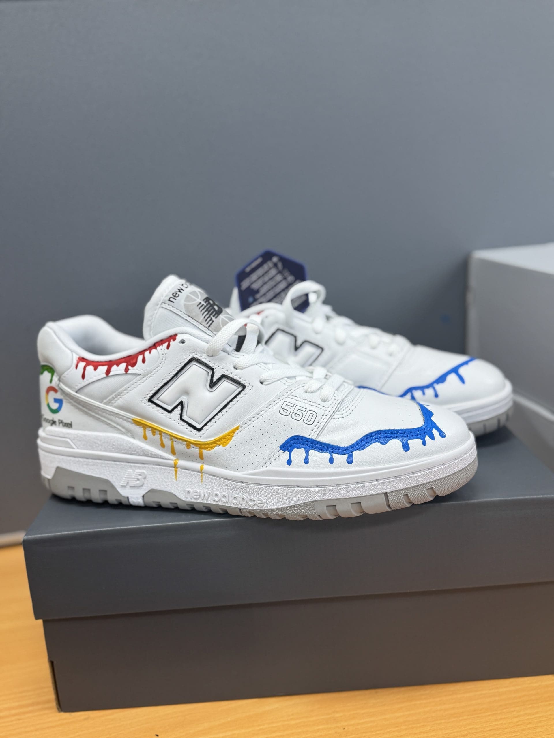 customised New Balance shoes with company logo and colours